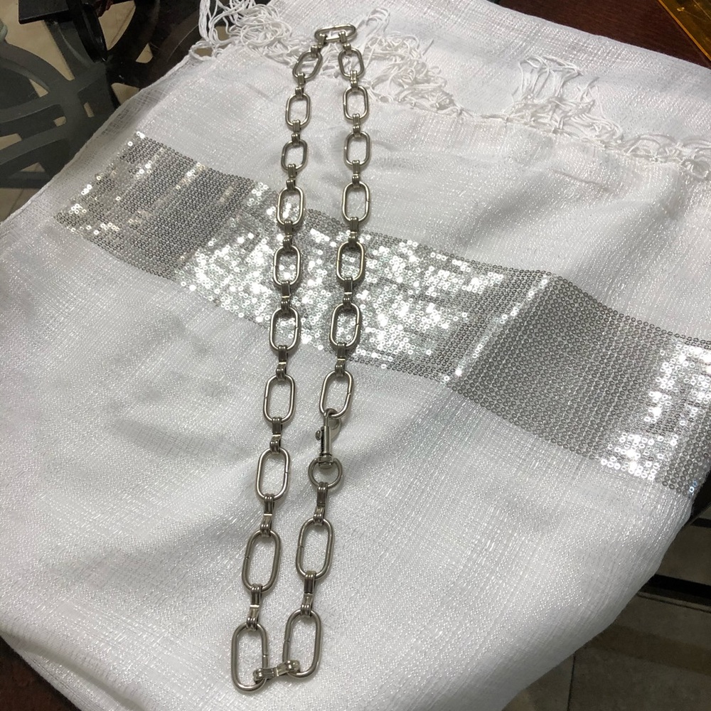 vintage metallic necklace with oval pieces.